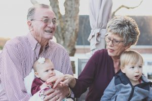 Grandparents with their grandchildren.