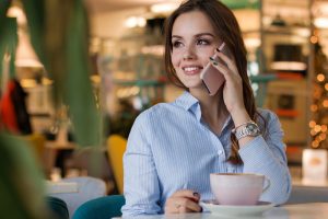 A woman talking on the phone.