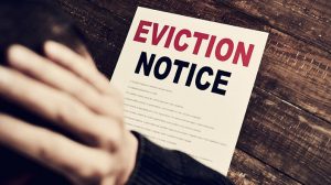Eviction Notice on table.