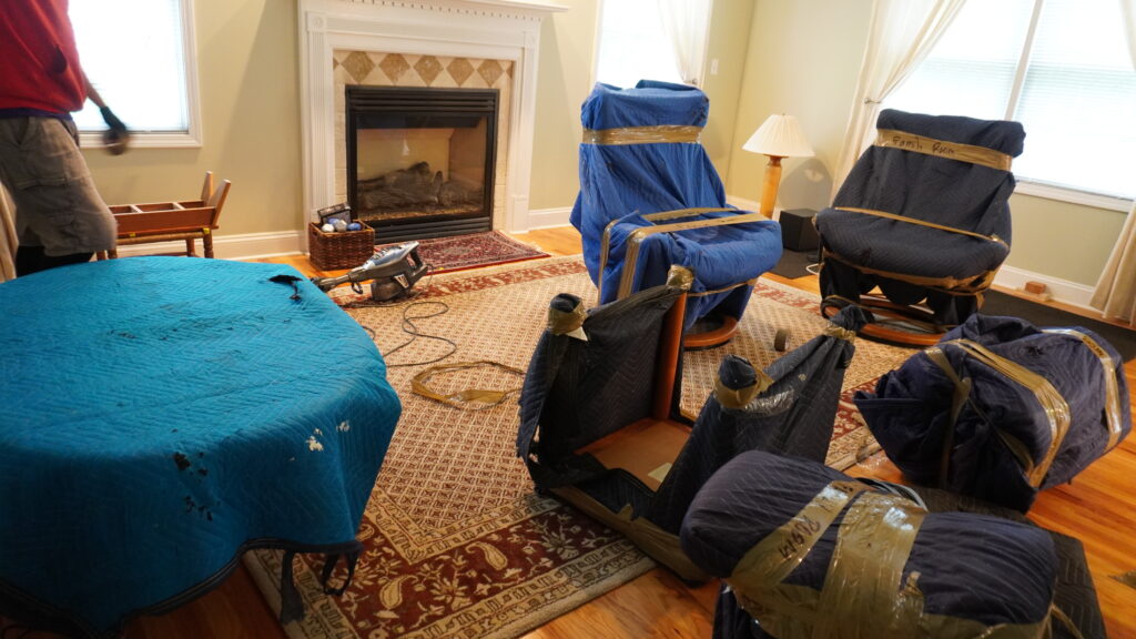 Interstate movers loading a truck for a state-to-state relocation from New Jersey.