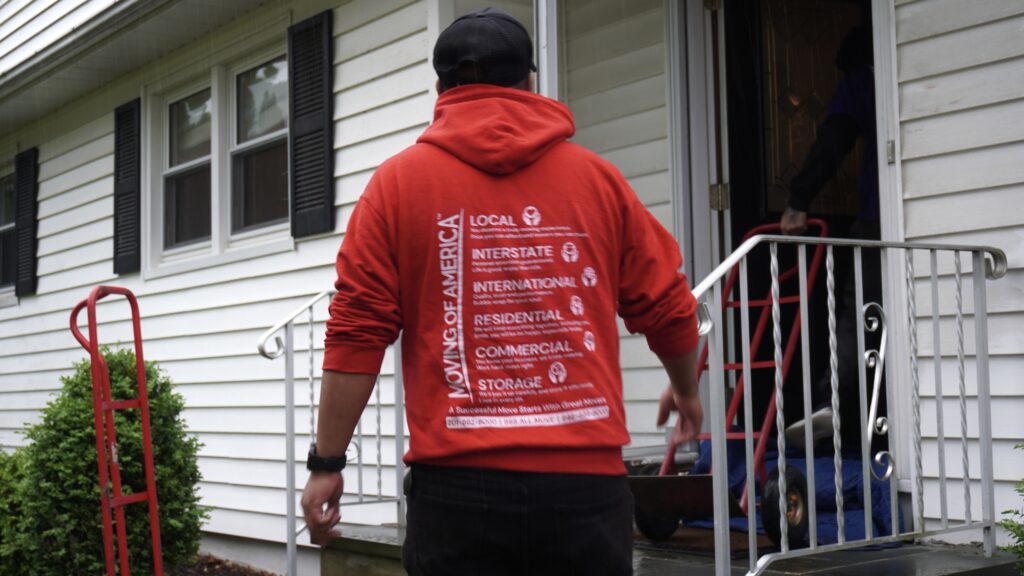 Residential moving specialists preparing belongings for safe transport in New Jersey.