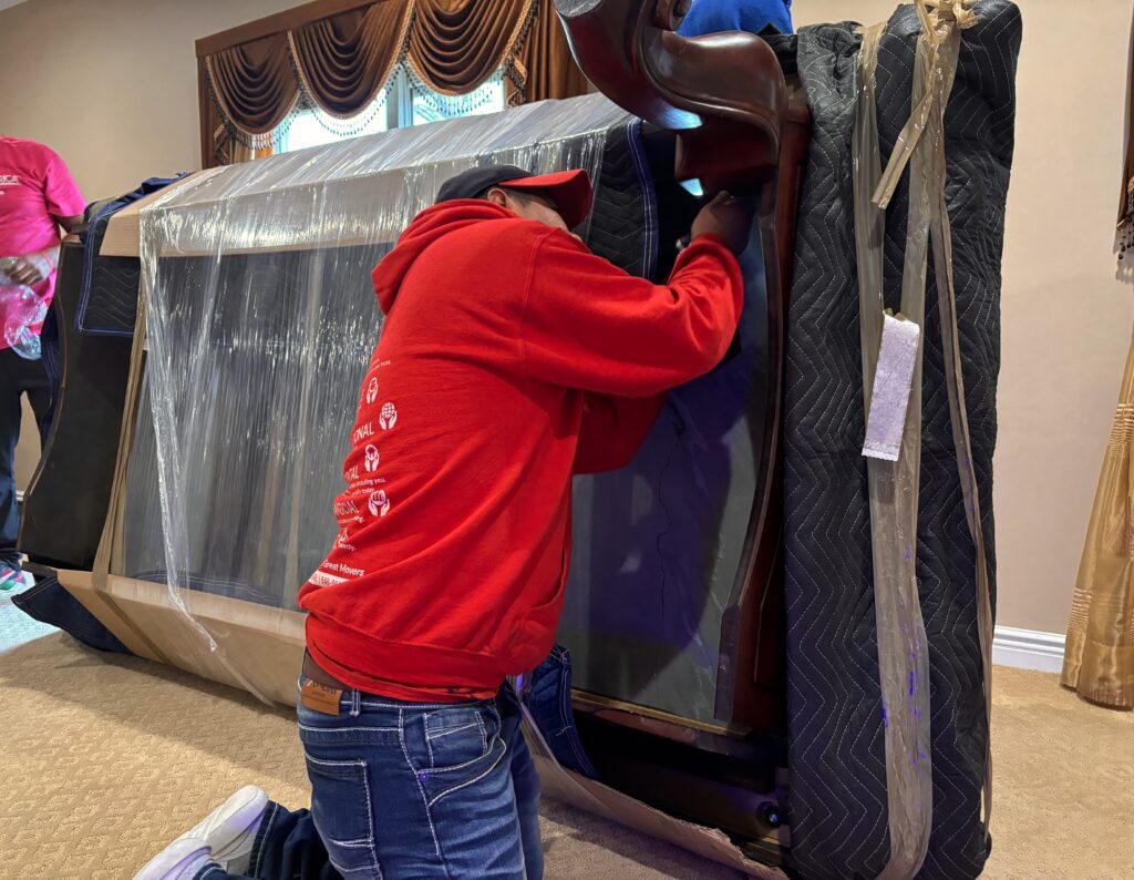 professional movers packing for a long distance move