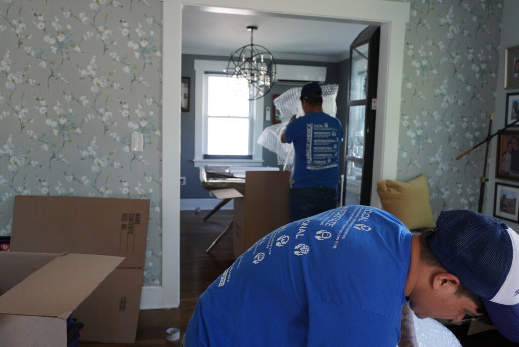 Moving of America movers delivering furniture to a new home in California